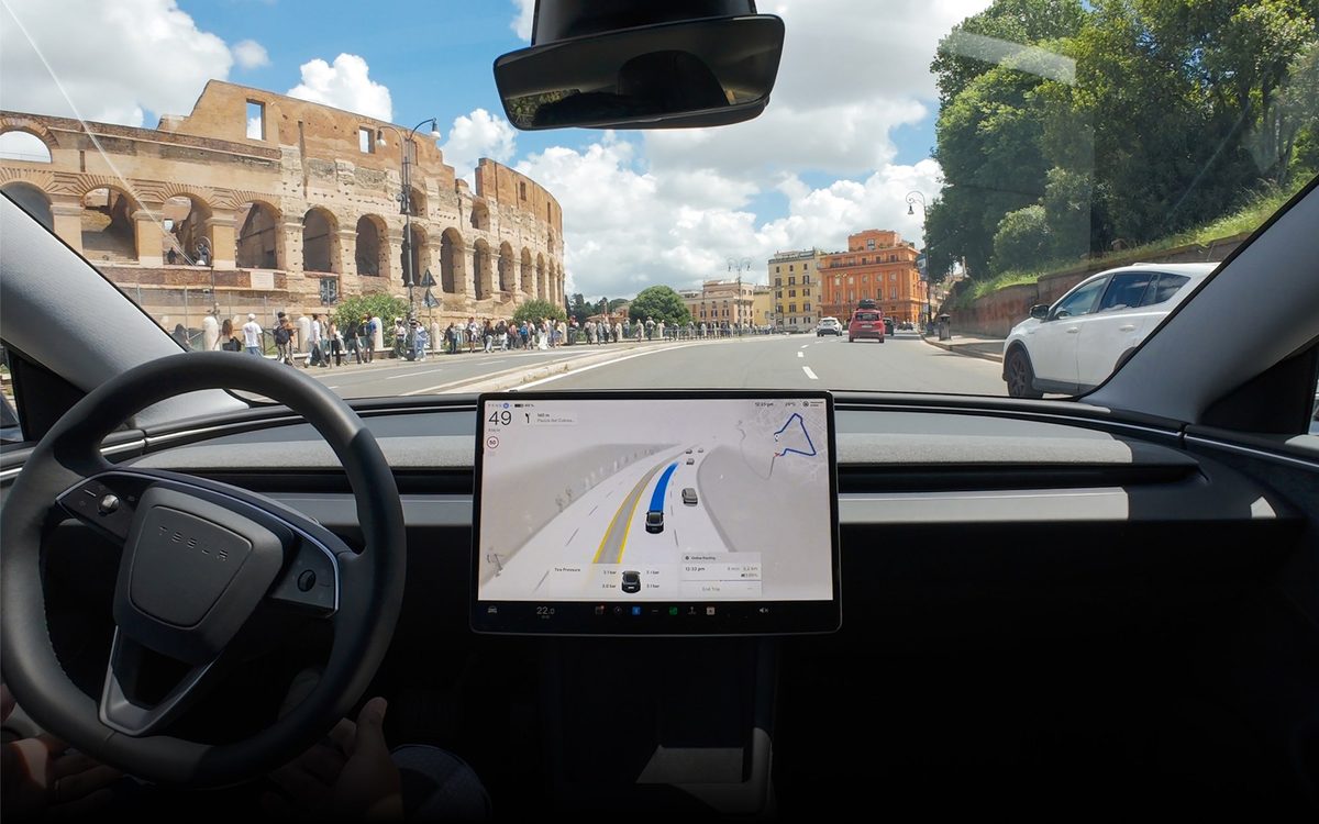 Tesla with FSD (Supervised) engaged on a street in Rome near the Colosseum
